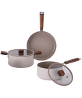 Bien 5-piece cookware set including a beige frying pan, saucepan, and pot. Each item features wooden handles and glass lids with a ceramic coating.