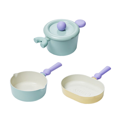 A set of three pastel-colored cookware items, including a light green pot with a lid, a light green saucepan, and a yellow grill pan, all with purple handles, displayed on a white background